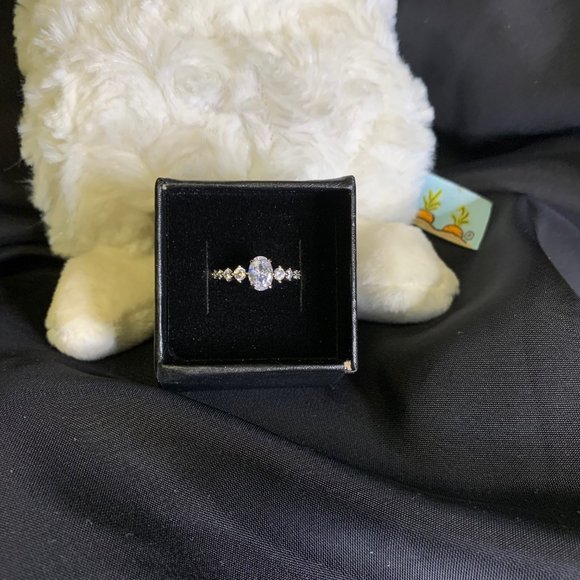 Silver Toned Ring with Oval Clear Stones With Eight Smaller Stones - Picture 3 of 12